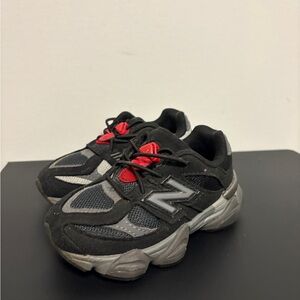 New Balance Kids Black and Gray Sneakers with Red Accents